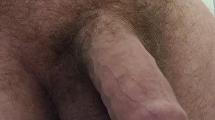 Daddy Bear jerks his fat uncut cock on public toilet with thick cumshot