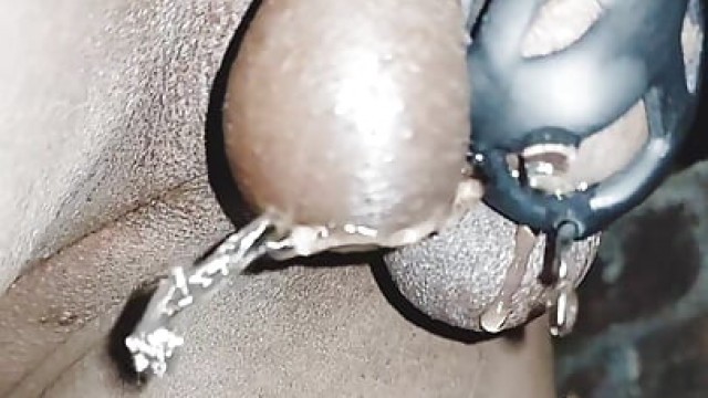 Piss walking while caged and plugged
